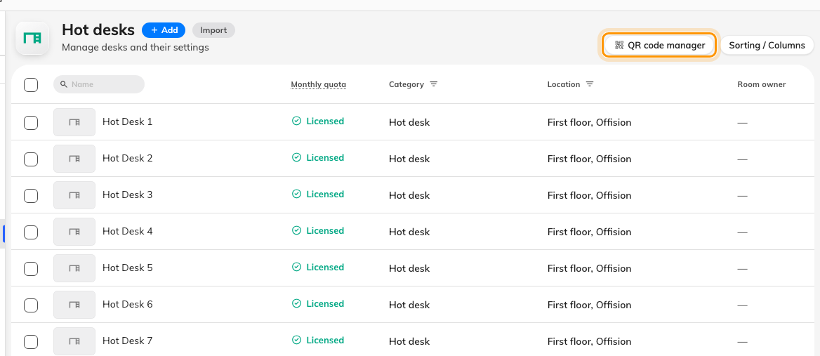 The Hot desks list — no Capacity column, and the QR code manager top right.
