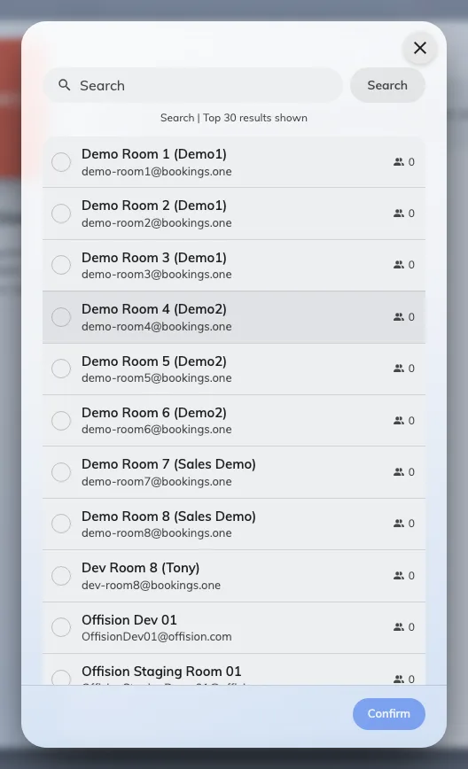Choosing a Microsoft 365 room. On Google Workspace there is no picker — rooms are typed in by calendar address.