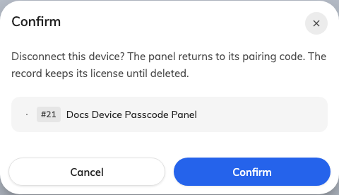 The confirm: the panel goes back to its pairing code, and the record keeps its licence until it is deleted.